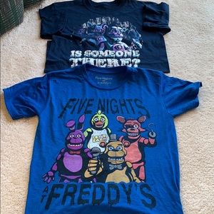 Boys small tee never worn.